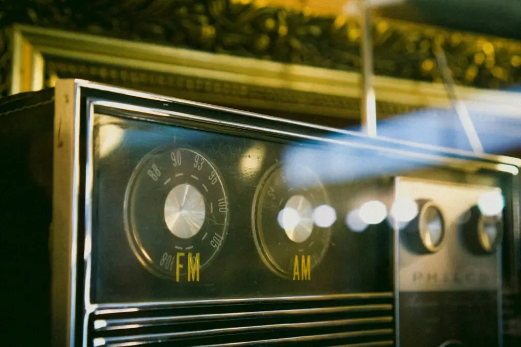 Vintage radio with FM and AM tuning dials showing frequency markings