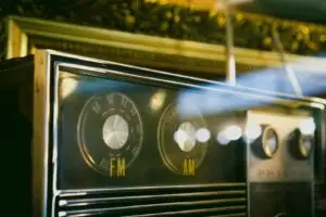 Vintage radio with FM and AM tuning dials showing frequency markings