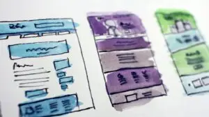 small-business-website-checklist-wireframes - Smart & Simple Communications - Smart & Simple Communications Hand-painted wireframe sketches of small business website page layouts for desktop and mobile, the planning step before a website build